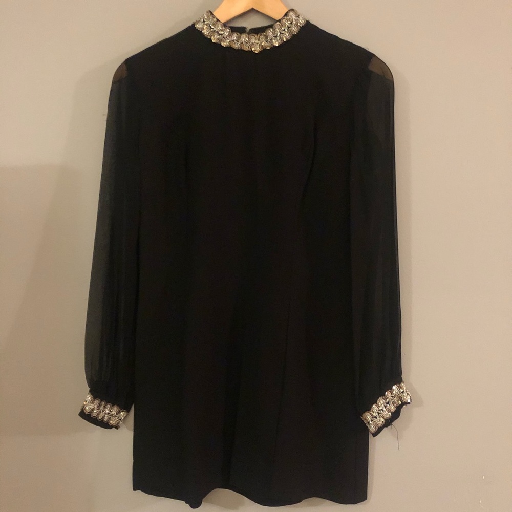 Vintage 70’s,80’s black mini dress with rhinestone neckline & cuffs.